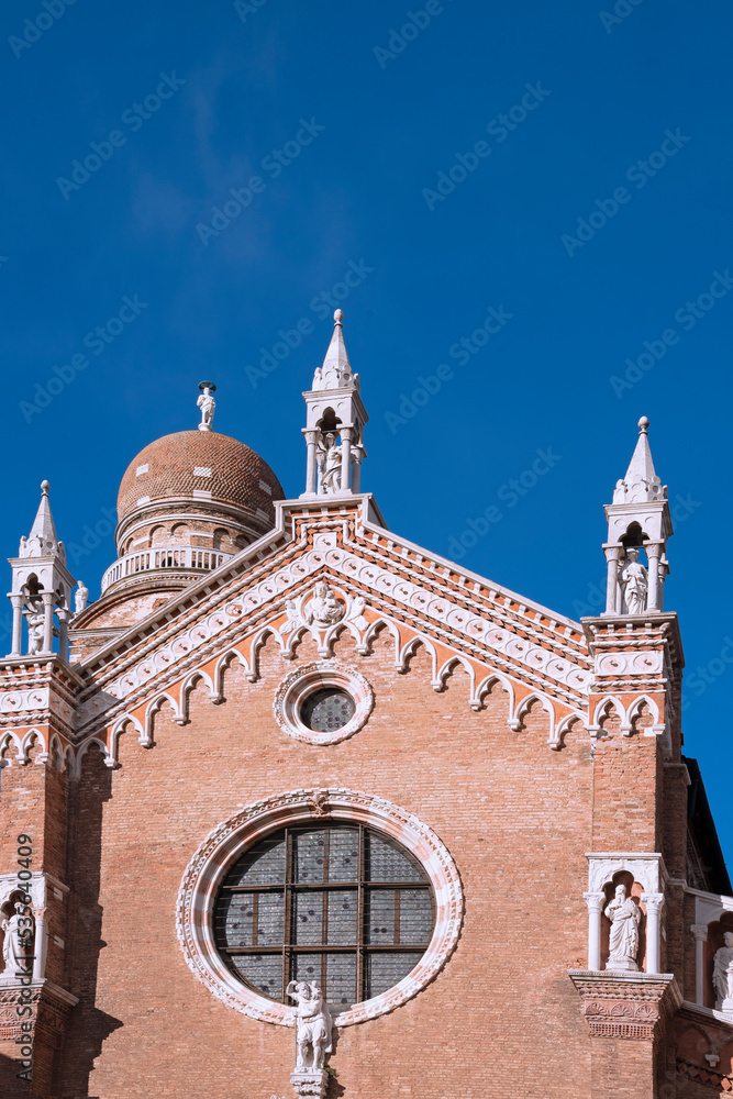 Facade detail of the the Madonna dell'Orto Church in Venice, founded in 1350 by the humiliated order from Lombardy and dedicated to saint Christopher, the patron saint of the gondoliers. 2019
