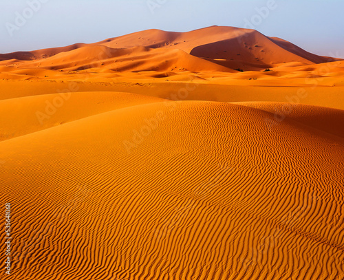 Amazing view of sand dunes in the Sahara Desert. Location: Sahara Desert, Merzouga, Morocco. Travel concept. Artistic picture. Beauty world.