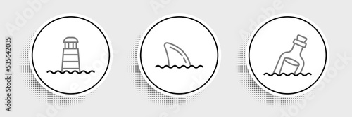 Set line Bottle with message in water, Lighthouse and Shark fin ocean wave icon. Vector