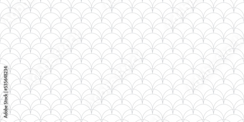 Art deco seamless pattern. Vector geometric linear background with thin curved lines, fish scale ornament, grid, lattice. Subtle elegant gray and white abstract texture. Simple wide minimal design