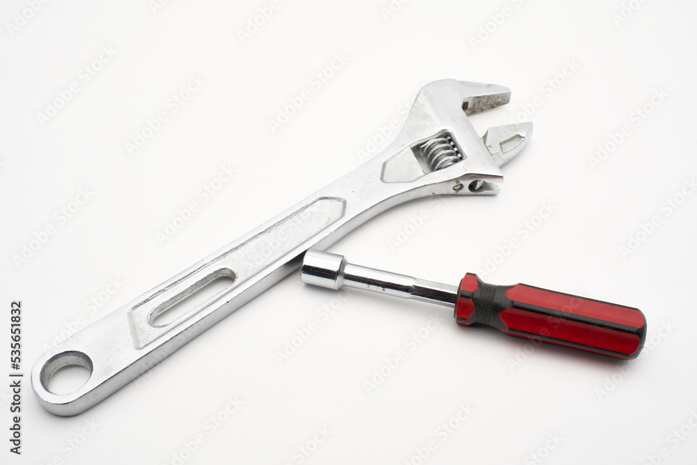 wrench and screwdriver on white wrench and screwdriver on white