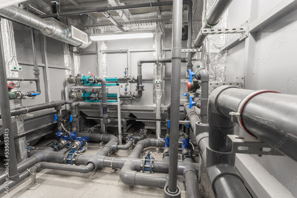 industrial water treatment. Plastic and metal pipes with fittings, valves industrial water treatment. Plastic and metal pipes with fittings, valves