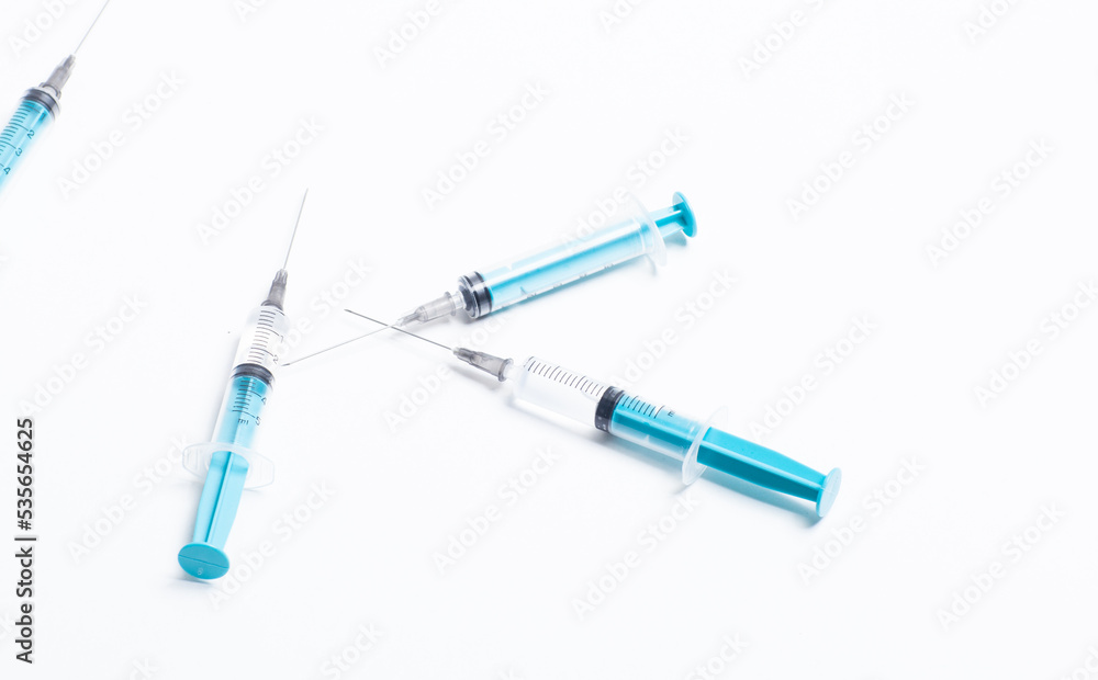 Disposable plastic syringe prepared for injection and vaccination in the hospital. The concept of medicine and health Disposable plastic syringe prepared for injection and vaccination in the hospital. The concept of medicine and health