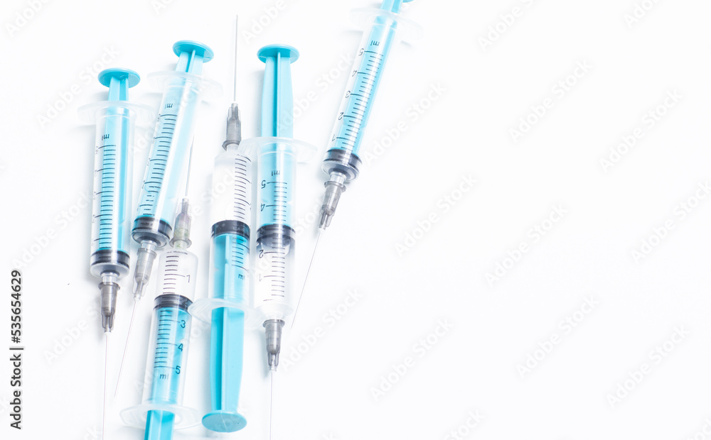 Disposable plastic syringe prepared for injection and vaccination in the hospital. The concept of medicine and health Disposable plastic syringe prepared for injection and vaccination in the hospital. The concept of medicine and health