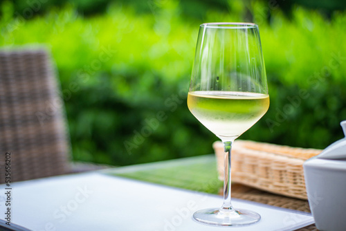 Glass of white wine in restaurant