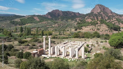 Aerial view with drone; Sardes (Sardis) Ancient City which has gymnasium and synagogue ruins and columns in Manisa, Turkey.