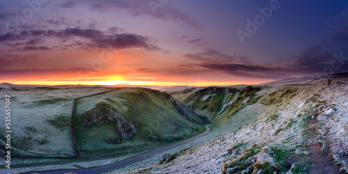 Frosty sunrise over Winnats Pass in the Peak District National Park, UK