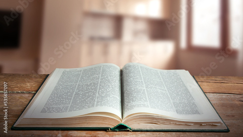 Open book on a wooden table