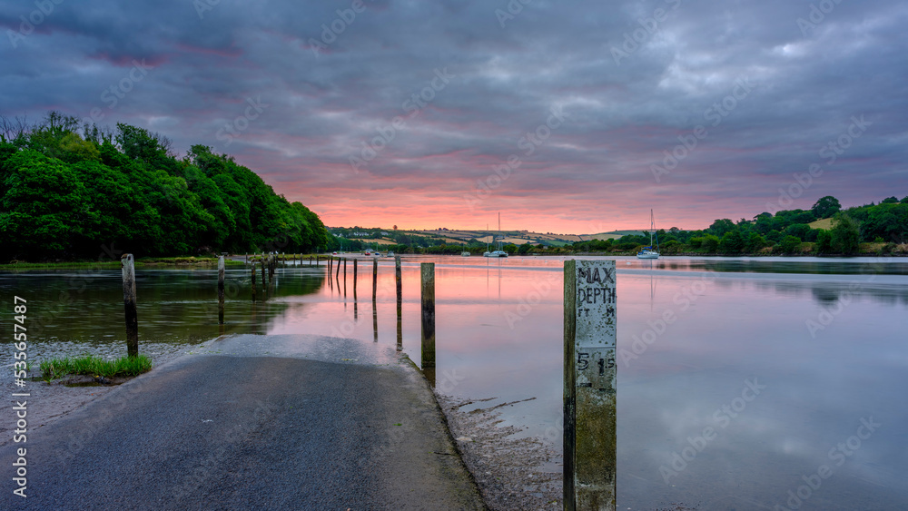 Sunrise on the River Avon tidal road near Aveton Gifford, South Hams, Devon, UK