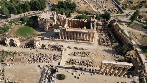 Ancient Roman temple of Bacchus with surrounding ruins photo