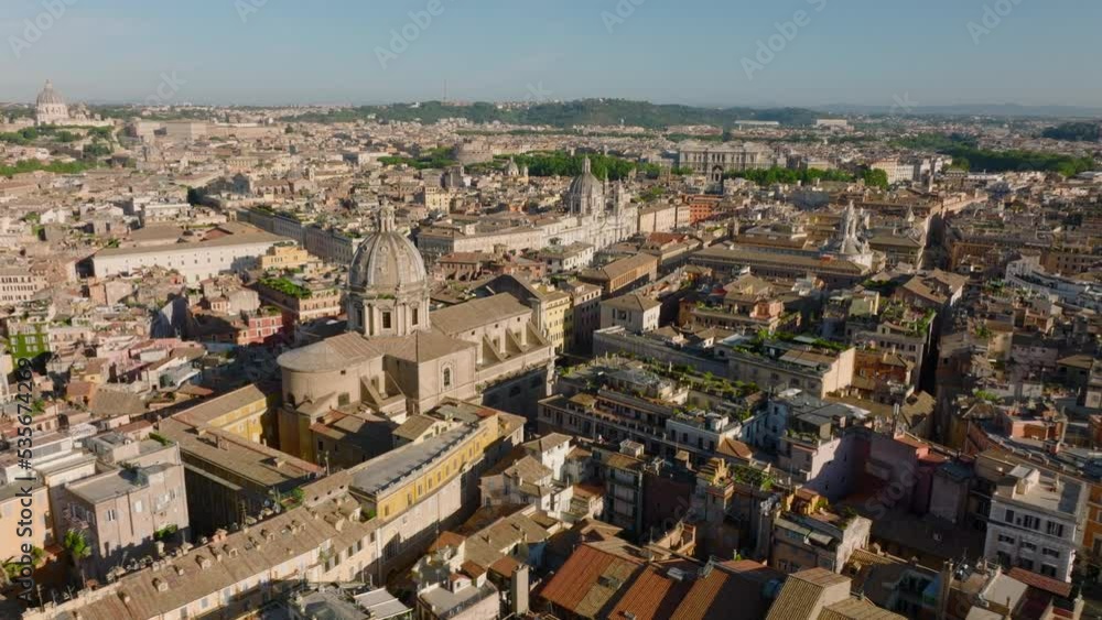 Aerial panoramic shot of large palaces and other tourist landmarks in historic city centre at dusk. Rome, Italy Aerial panoramic shot of large palaces and other tourist landmarks in historic city centre at dusk. Rome, Italy