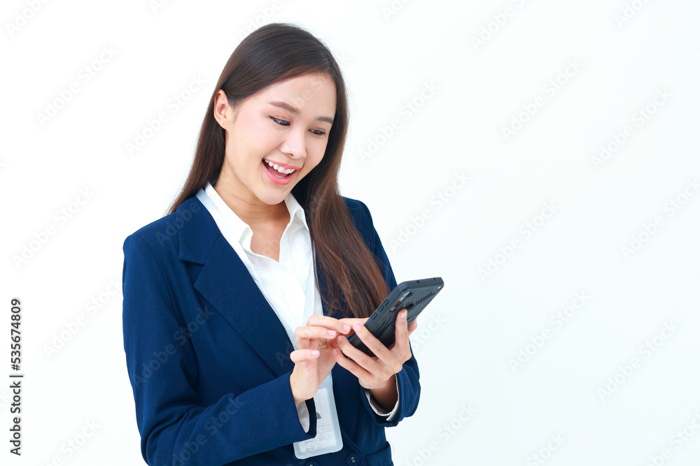 female manager wearing a blue suit Holding a black smartphone standing on a white background. Concept of business woman, entrepreneur. Modern communication technology. Social online. female manager wearing a blue suit Holding a black smartphone standing on a white background. Concept of business woman, entrepreneur. Modern communication technology. Social online.