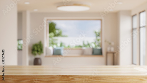 Empty wooden table with blurred view of scandinavian living room. photo