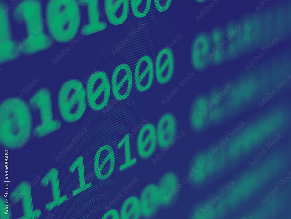 Closeup view of binary computer code with green 1s and 0s displayed on a blue screen with focus blur effect Closeup view of binary computer code with green 1s and 0s displayed on a blue screen with focus blur effect