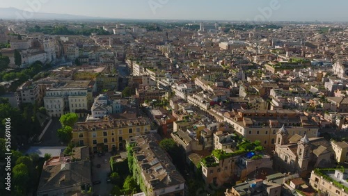 Wallpaper Mural Aerial descending footage of old town development in historic city centre. Buildings and landmarks lit by bright morning sun. Rome, Italy Torontodigital.ca