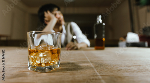 abuse, addict, addicted, addiction, adult, alcohol, alcoholic, alcoholism, alone, background, bad, bar, beverage, booze, bottle, brandy, closeup, cognac, cool, crisis, dependence, depressed, depressio photo