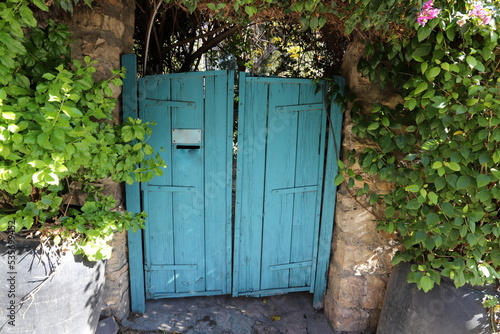 City entrance doors to a building in a big city in Israel.