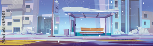 Empty bus stop in winter city. Cartoon vector illustration of public transport station covered with snow against urban architecture background. Snowfall in town street with modern buildings and road