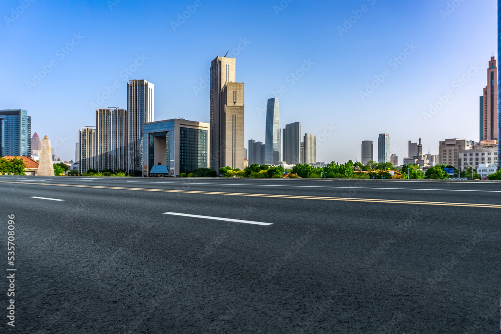 Road and modern city buildings landscape skyline Road and modern city buildings landscape skyline