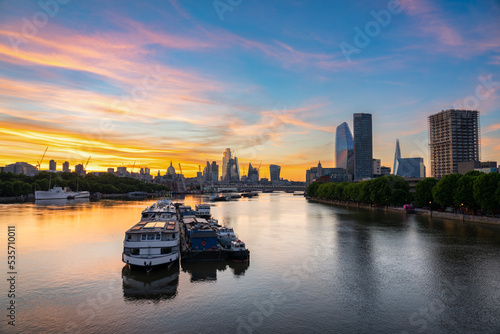 City of London skyline over river Thames at sunrise. England