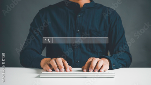 Searching Browsing Internet Data Information with blank search bar.businessman working with computer laptop on desk.SearchEngine Optimization SEO Networking Concept.