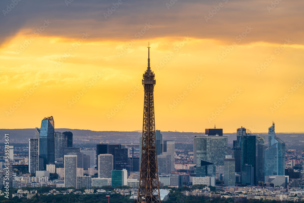 Top of Eiffel Tower at sunset in Paris. France
