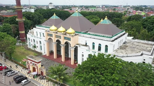 Palembang city is seen from the air. there is the sultan mahmud badaruddin jayo wikramo mosque. Palembang, Sumatera Selatan. Indonesia. photo