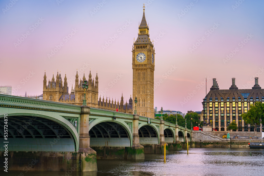 Big Ben and Westminster bridge at sunrise in London. England
