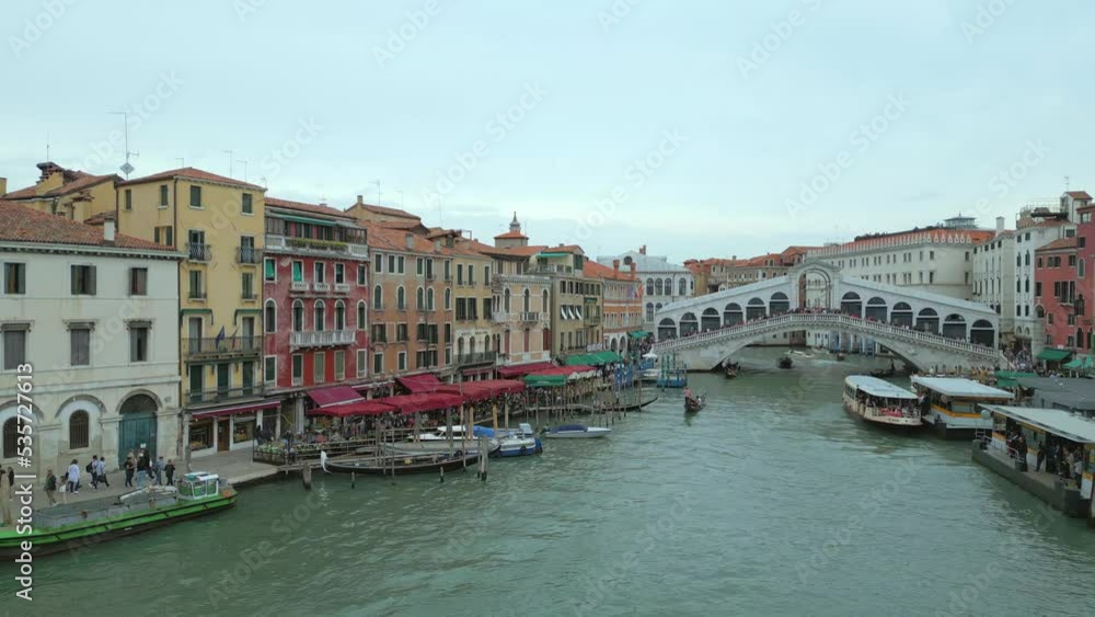 4K Aerial of San Marco, the Rialto Bridge, and the canals in Venice, Italy on a cloudy day. 4K Aerial of San Marco, the Rialto Bridge, and the canals in Venice, Italy on a cloudy day.