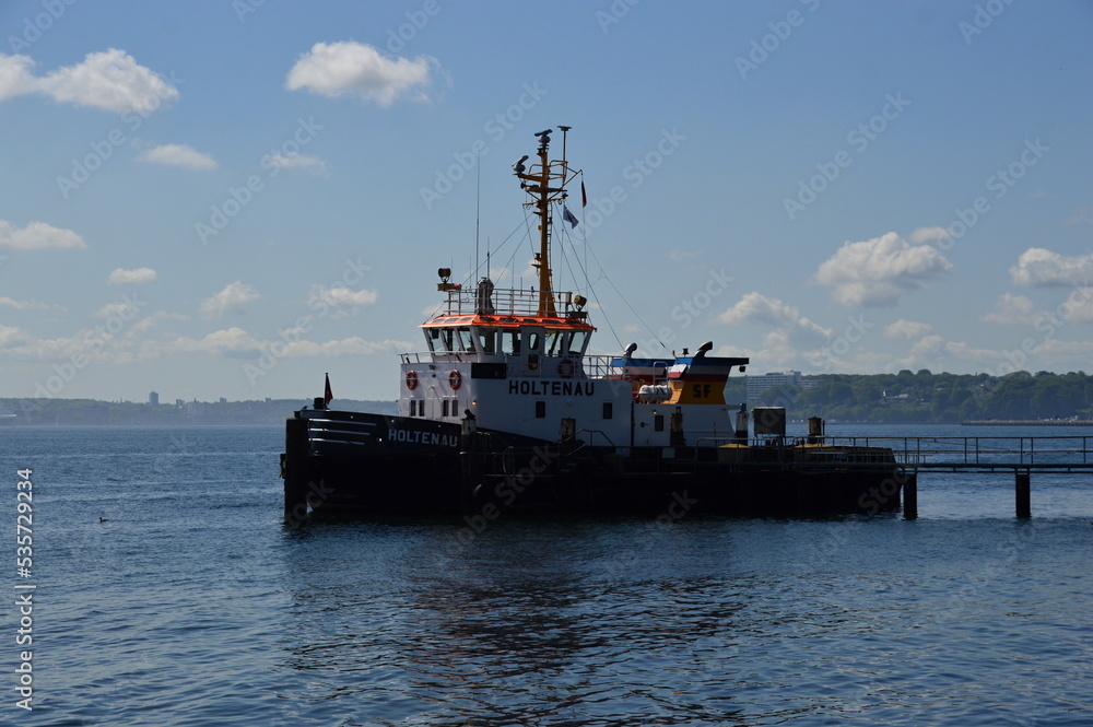 Tug Boat on the Canal between the North Sea and the Baltic Sea in Kiel, the Capital City of Schleswig - Holstein