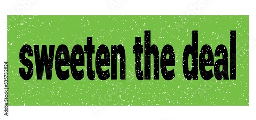 sweeten the deal text written on green-black stamp sign.