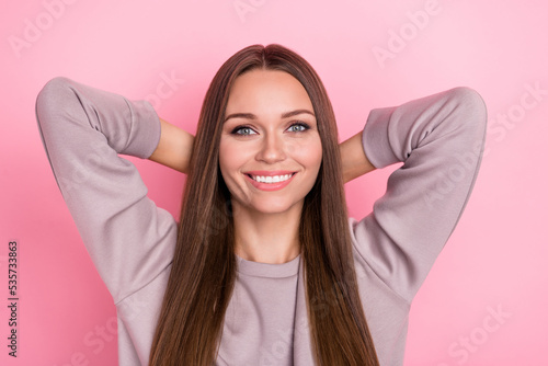 Portrait of satisfied cute nice lady office manager have free time arm behind head isolated on pink color background #535733863
