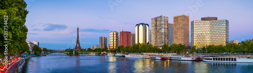 Sunset skyline panorama of Beaugrenelle district of Paris with Eiffel Tower in the background. France