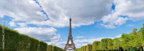 Eiffel Tower panoramic view from Champ de Mars park in Paris. France