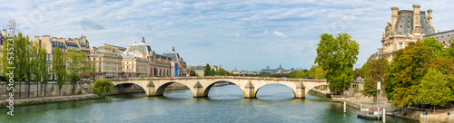 Photography Pont du Carrousel bridge by the Seine river in morning light, Paris