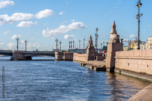 View of the Sphinxes on the University Embankment and the Blagoveshchensky Bridge in St. Petersburg, Russia photo