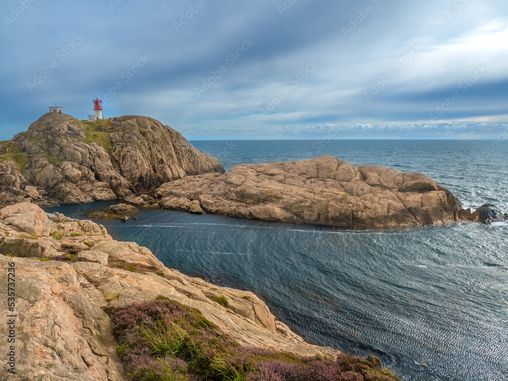 The fanous Lindesnes Lighthouse (Lindesnes fyr) at the southernmost tip of Norway, Agder county. - obrazy, fototapety, plakaty 