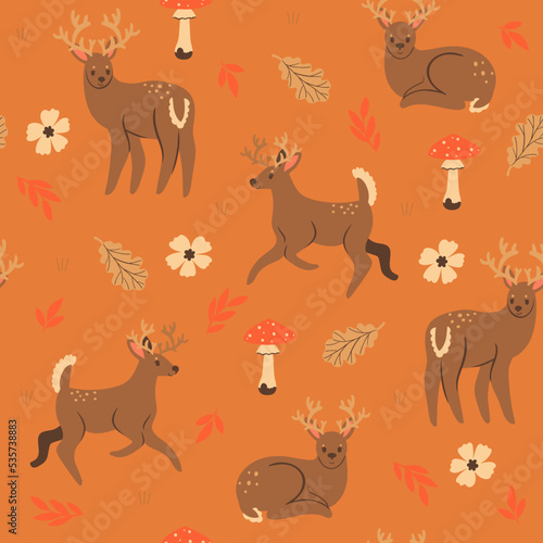 Seamless pattern with deer, autumn leaves and fly agaric. Vector graphics.