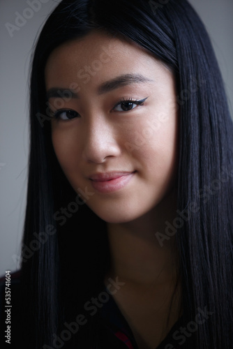 Portrait of beautiful Vietnamese girl. Headshot of cute Asian female person © hurricanehank