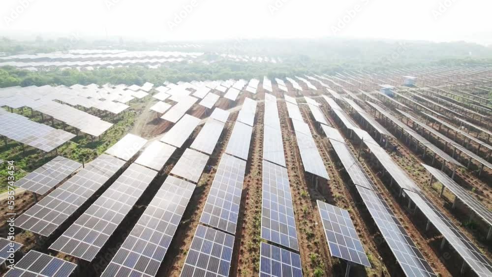 aerial view of solar power station in field aerial view of solar power station in field