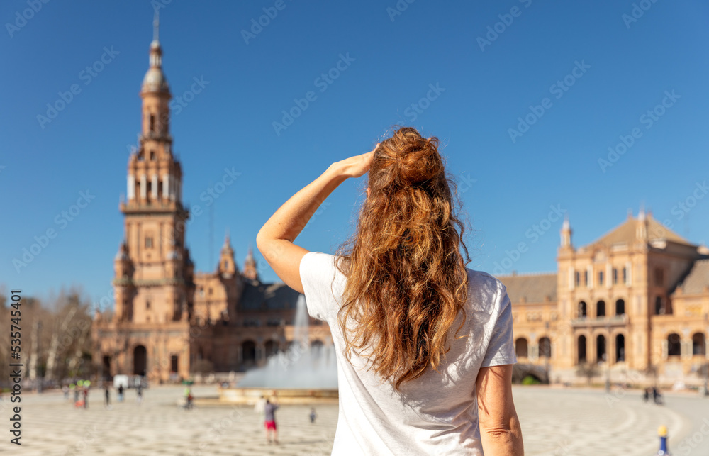 Fototapeta premium Traveler woman tourist at Seville looking at Plaza de Espagna