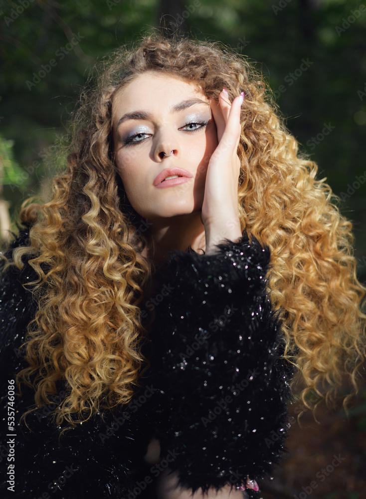 Portrait of young beautiful woman. Natural light. Shallow depth of field. Portrait of young beautiful woman. Natural light. Shallow depth of field.