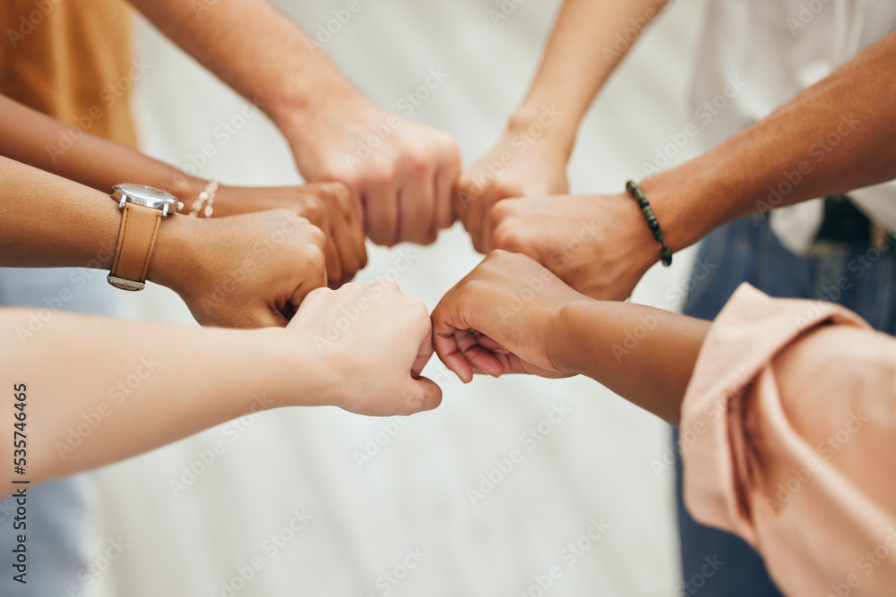 Fist bump, hands and teamwork support hand sign showing community, team building and goal success. Friends or work employees with solidarity together to show diversity mission collaboration and trust Fist bump, hands and teamwork support hand sign showing community, team building and goal success. Friends or work employees with solidarity together to show diversity mission collaboration and trust