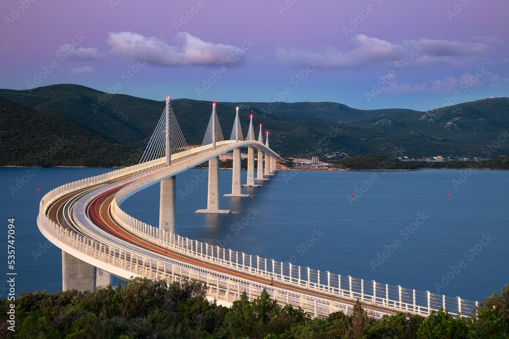 Peljesac Bridge, Croatia. Image of beautiful modern multi-span cable-stayed Peljesac Bridge over the sea in Dubrovnik-Neretva County, Croatia at sunrise.