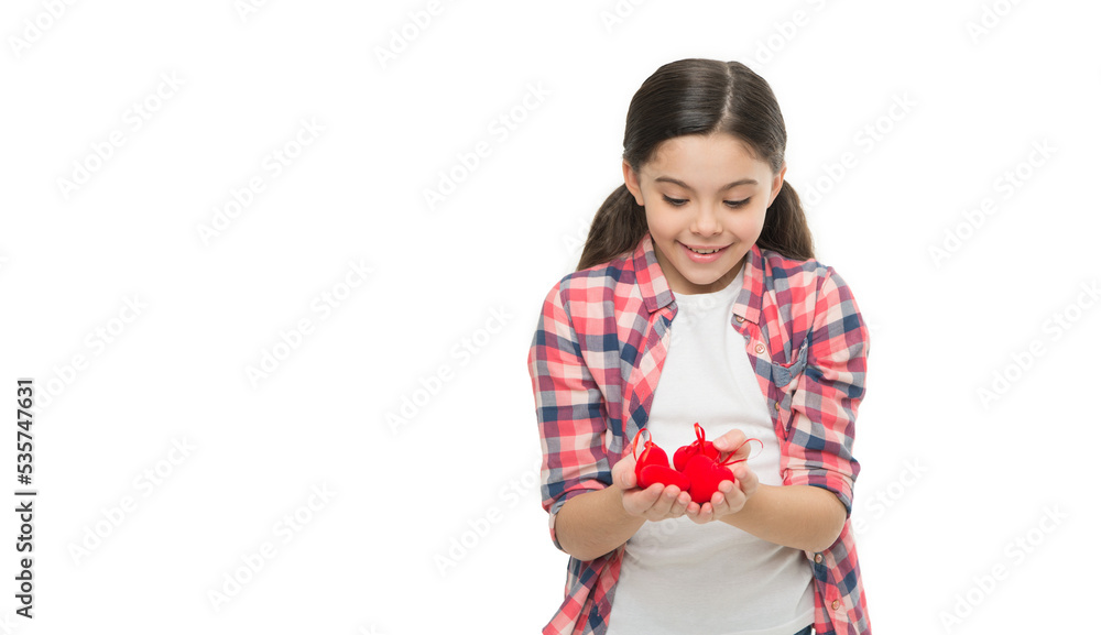 I believe in love. Heart in hand. Valentine concept. wedding decor shop. Sweet girl with red heart. small girl hold red decorative hearts. heart symbol of love. Happy little girl with Valentines gift I believe in love. Heart in hand. Valentine concept. wedding decor shop. Sweet girl with red heart. small girl hold red decorative hearts. heart symbol of love. Happy little girl with Valentines gift