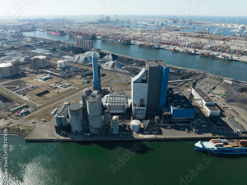 Coal power plant station energy electricity generation installation on the Maasvlakte in harbour port of Rotterdam. Climate change industrial emission pollution and emissions plant. photo