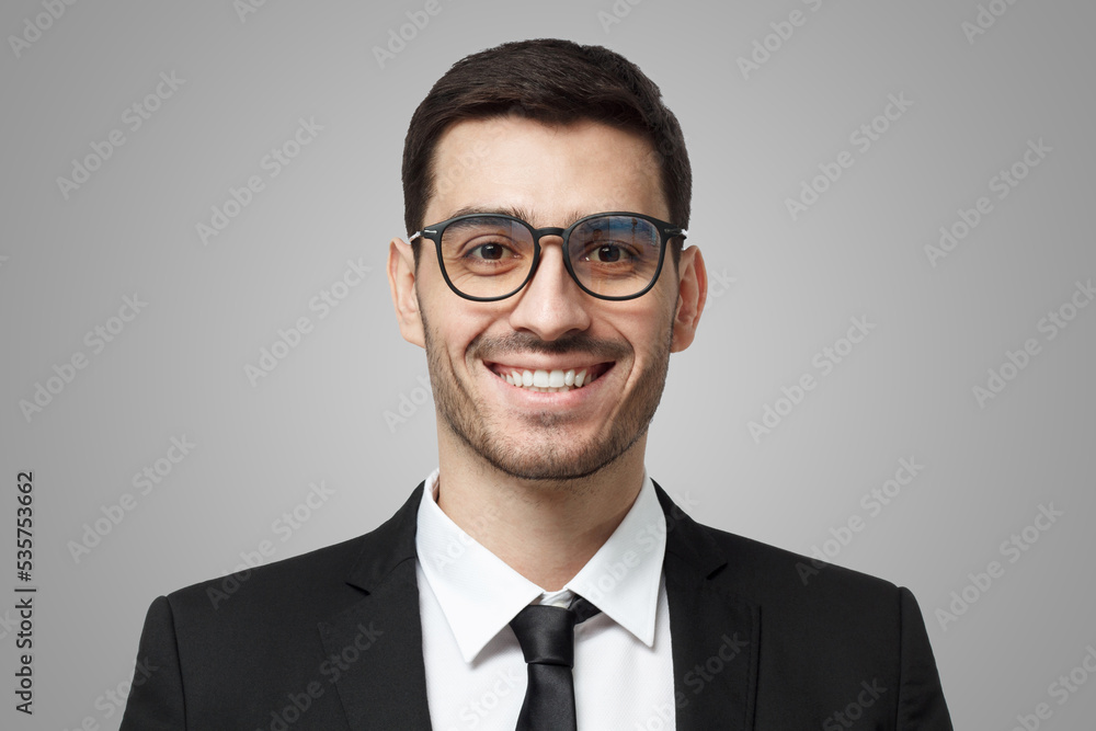 Confident smiling relaxed man in glasses and formal black suit ready for future business success Confident smiling relaxed man in glasses and formal black suit ready for future business success