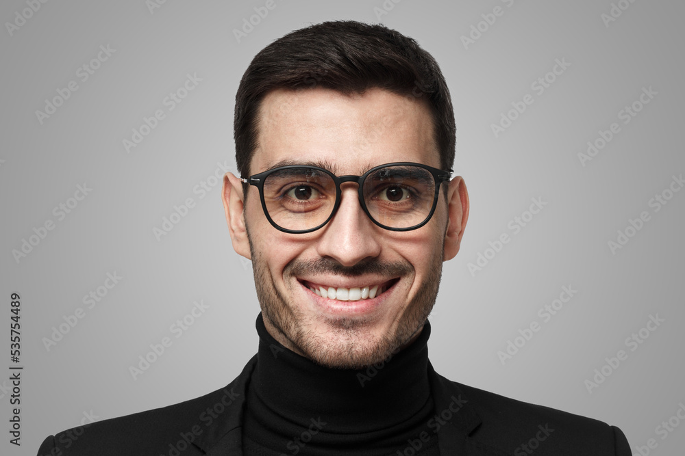 Close up portrait of art director or artist on grey background Close up portrait of art director or artist on grey background