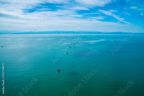 Germany  bodensee lake panorama view from friedrichshafen city in beautiful nature landscape to switzerland coastline  aerial view above