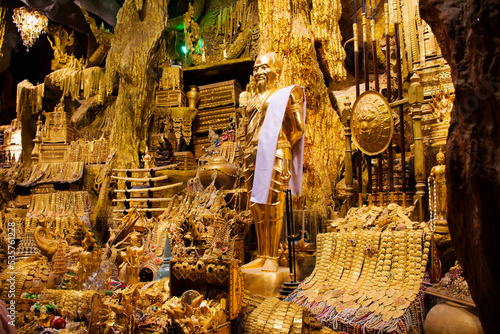 Tunnel naka cave underground and treasure for thai people travel visit respect praying blessing holy worship mystical naga statue at Wat Maniwong temple on September 6, 2022 in Nakhon Nayok, Thailand photo
